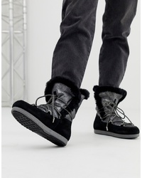 Женские черные зимние ботинки от Moon Boot