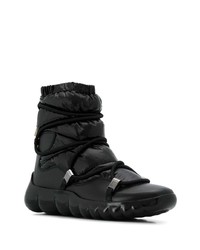Женские черные зимние ботинки от Moncler