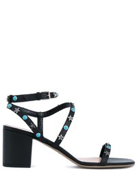 Черные кожаные босоножки на каблуке с шипами от Valentino Garavani