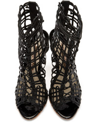 Черные кожаные босоножки на каблуке от Sophia Webster