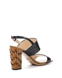 Черные кожаные босоножки на каблуке от Dino Ricci