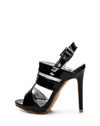 Черные кожаные босоножки на каблуке от Donna Moda