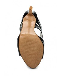 Черные кожаные босоножки на каблуке от Donna Moda