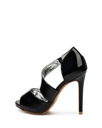 Черные кожаные босоножки на каблуке от Donna Moda