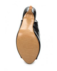 Черные кожаные босоножки на каблуке от Donna Moda