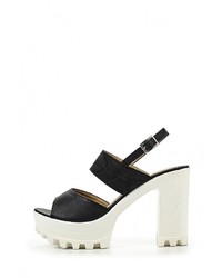 Черные кожаные босоножки на каблуке от Elche