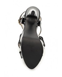 Черные кожаные босоножки на каблуке от Elche