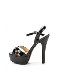 Черные кожаные босоножки на каблуке от Elche