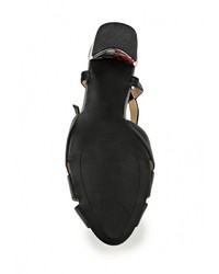 Черные кожаные босоножки на каблуке от Indiana