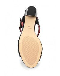 Черные кожаные босоножки на каблуке от Julia Grossi