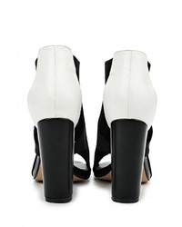 Черные кожаные босоножки на каблуке от LOST INK