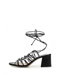 Черные кожаные босоножки на каблуке от Mango