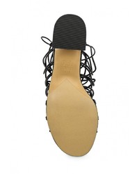 Черные кожаные босоножки на каблуке от Mango