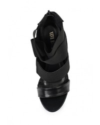 Черные кожаные босоножки на каблуке от Queen Vivi