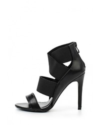 Черные кожаные босоножки на каблуке от Queen Vivi