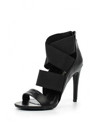 Черные кожаные босоножки на каблуке от Queen Vivi
