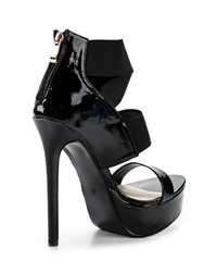 Черные кожаные босоножки на каблуке от Sergio Todzi