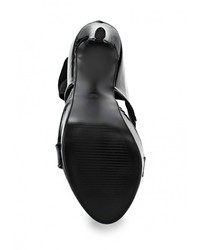 Черные кожаные босоножки на каблуке от Sergio Todzi