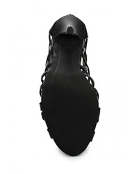 Черные кожаные босоножки на каблуке от Spurr