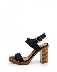 Черные кожаные босоножки на каблуке от Spurr