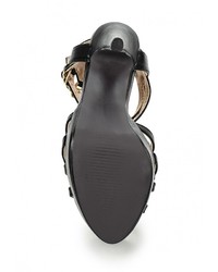 Черные кожаные босоножки на каблуке от Tulipano