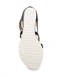 Черные кожаные босоножки на танкетке от Bellamica