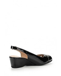 Черные кожаные босоножки на танкетке от Caprice