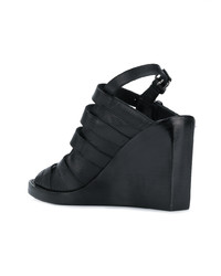 Черные кожаные босоножки на танкетке от Ann Demeulemeester