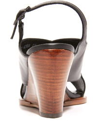 Черные кожаные босоножки на танкетке от Robert Clergerie