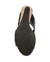 Черные кожаные босоножки на танкетке от Marco Tozzi