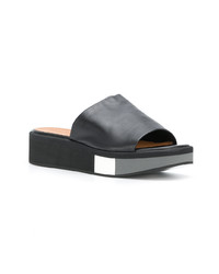 Черные кожаные босоножки на танкетке от Clergerie