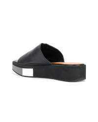 Черные кожаные босоножки на танкетке от Clergerie