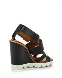 Черные кожаные босоножки на танкетке от See by Chloe