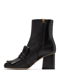 Черные кожаные ботильоны c бахромой от Gucci