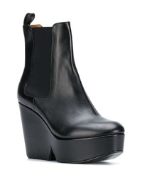 Черные кожаные ботильоны на танкетке от Clergerie