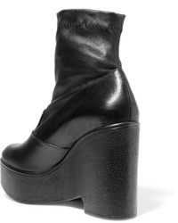 Черные кожаные ботильоны на танкетке от Robert Clergerie