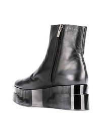 Черные кожаные ботильоны на танкетке от Clergerie