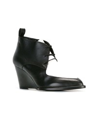 Черные кожаные ботильоны на танкетке от Robert Clergerie