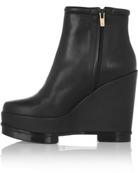 Черные кожаные ботильоны на танкетке от Robert Clergerie