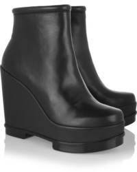 Черные кожаные ботильоны на танкетке от Robert Clergerie