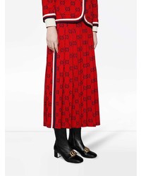 Черные кожаные ботильоны с украшением от Gucci