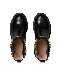 Черные кожаные ботильоны с украшением от Gucci