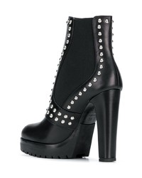 Черные кожаные ботильоны с шипами от Alexander McQueen