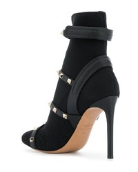 Черные кожаные ботильоны с шипами от Valentino