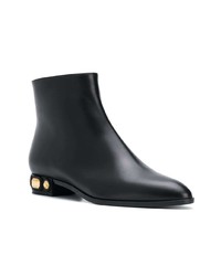 Черные кожаные ботильоны с шипами от Casadei