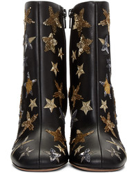 Черные кожаные ботильоны со звездами от Valentino