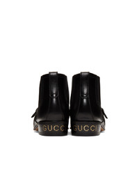 Черные кожаные ботильоны от Gucci