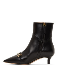 Черные кожаные ботильоны от Gucci