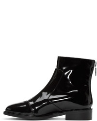 Черные кожаные ботильоны от Courreges