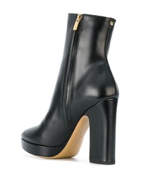 Черные кожаные ботильоны от Salvatore Ferragamo